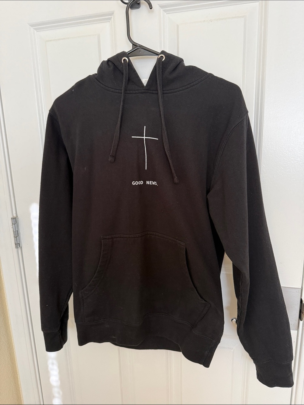 Black Pullover Hoodie with White Cross Graphic